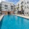 Resident swimming pool surrounded by apartments