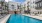 Resident swimming pool surrounded by apartments